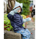 REGNVOTT BARN-TOLVMETERSKOGEN BRIS