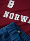 NMNHITEAM SHORT SET MINI - RHUBARB